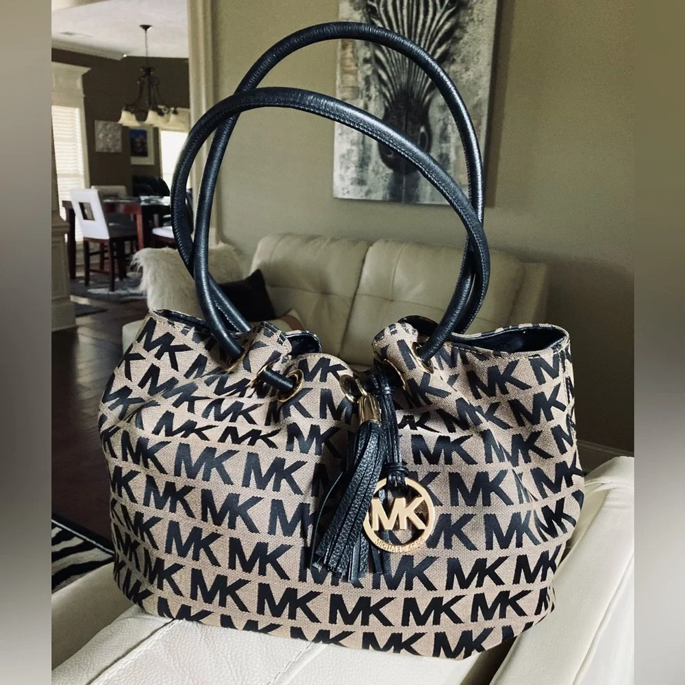 Michael Kors Coated Canvas Bucket Drawstring Bag. - Picture 6 of 9